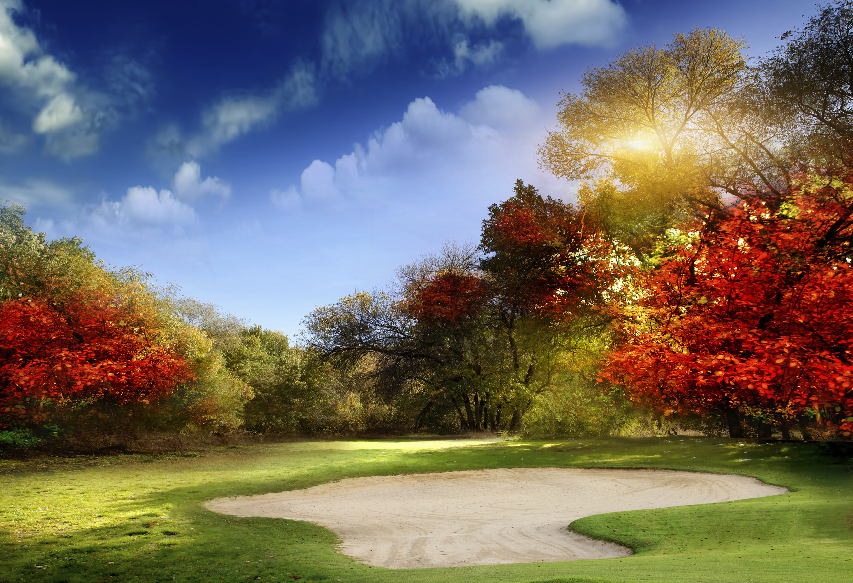 golf course at dawn backlit by rising sun Explore Minnesota Golf