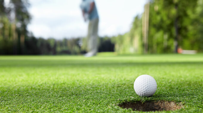 Golfer Drove The Ball Into The Hole